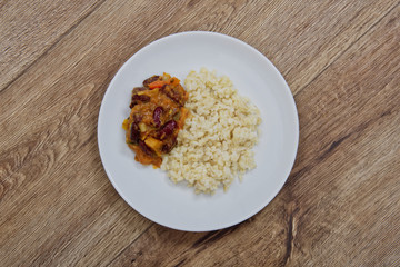 Bean goulash with bulgur on a table