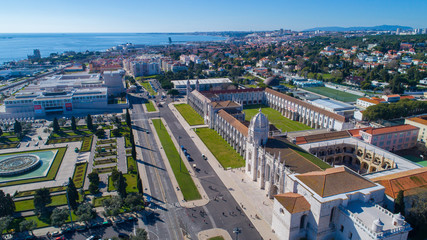 Obraz premium Surroundings of church and cloister of Mosteiro dos Jerónimos,Belém,Lisbon.The Jeronimos Monastery is National Pantheon,one of the important attractions of Portugal.Beautiful garden of Empire square
