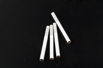 cigarettes isolated on black background