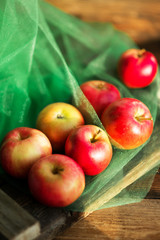 a group of red garden fresh apples on wooden background natural concept for fresh natural food and vitamins
