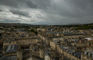 A bird's eye view of old architecture in the city of Bath, England from a bell tower.