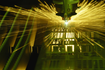 The fiber laser cutting machine controller by CNC program.The sheet metal cutting process by CNC fiber laser cutting.