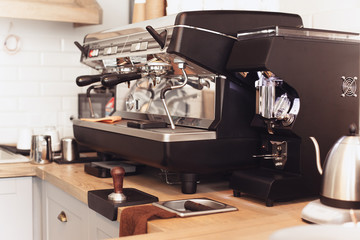 A table setting for coffee on the counter at a coffee house