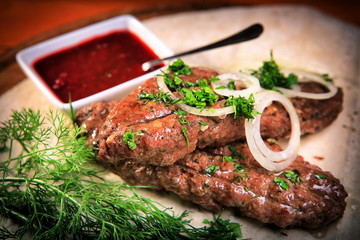 Lula kebab with onions and greens