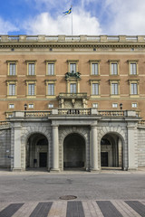 View of Royal Palace northern facade (Stockholms slott or Kungliga slottet, 1760) at Gamla Stan (Old Town). Palace is official residence and major royal palace of Swedish monarch. Stockholm, Sweden.