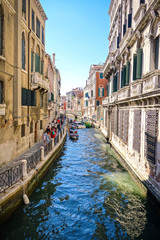 Venice canal with historic buildings around