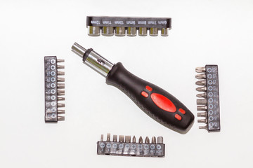 many type of screwdriver head and screwdriver on white background