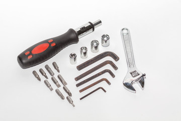 many type of screwdriver head and screwdriver on white background