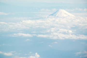 Fuji mountain in Japan with the group of cloud in the aerial view background