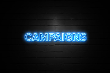 Obraz premium Campaigns neon Sign on brickwall