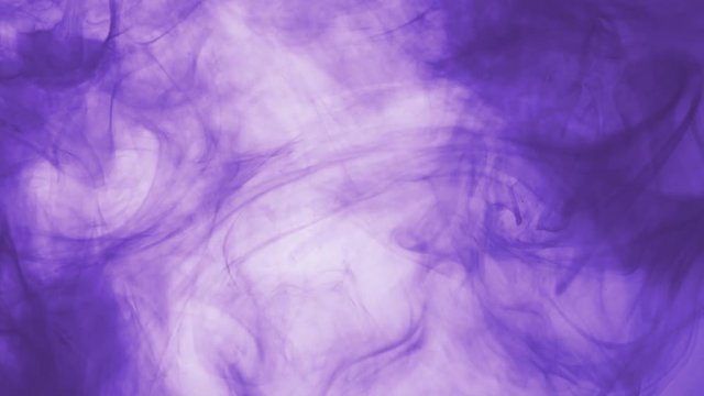 violet paint floating in water like smoke cloud
