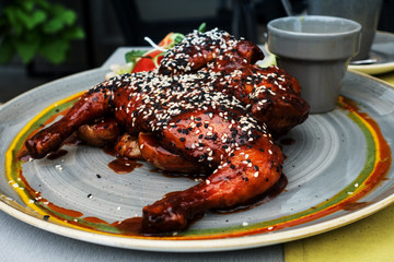 delicious fried chicken wings with sauce