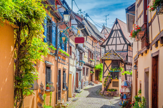 Charming street scene in old medieval village in Europe in summer