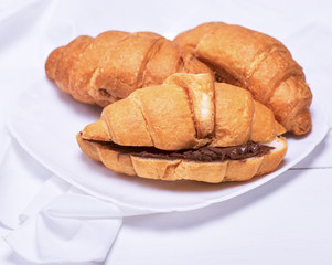 baked croissants with chocolate