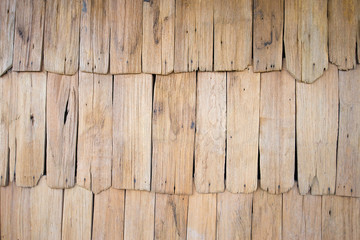 The design of the wall is made of many pieces of wood combined w