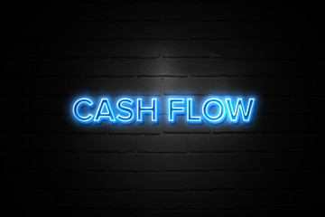 Cash Flow neon Sign on brickwall