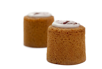 Runeberg tart cake torte isolated on white background. Finnish pastry made of almonds, rum, raspberry jam and sugar icing. Traditional Finnish dessert on February 05