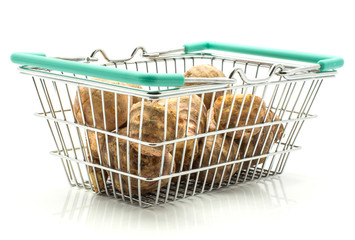 Jerusalem artichoke tubers in a shopping basket isolated on white background sweet crisp topinambur.