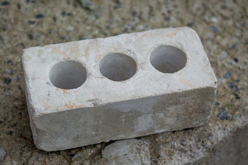 white brick for construction works on the concrete slab