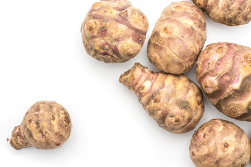 Jerusalem artichoke tubers top view isolated on white background sweet crisp topinambur.