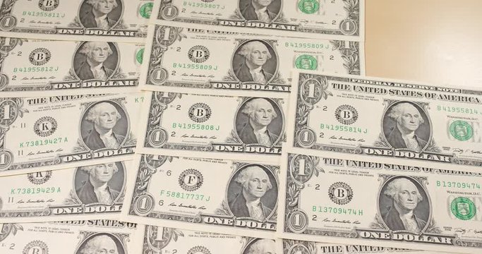 Picking US dollar from the table