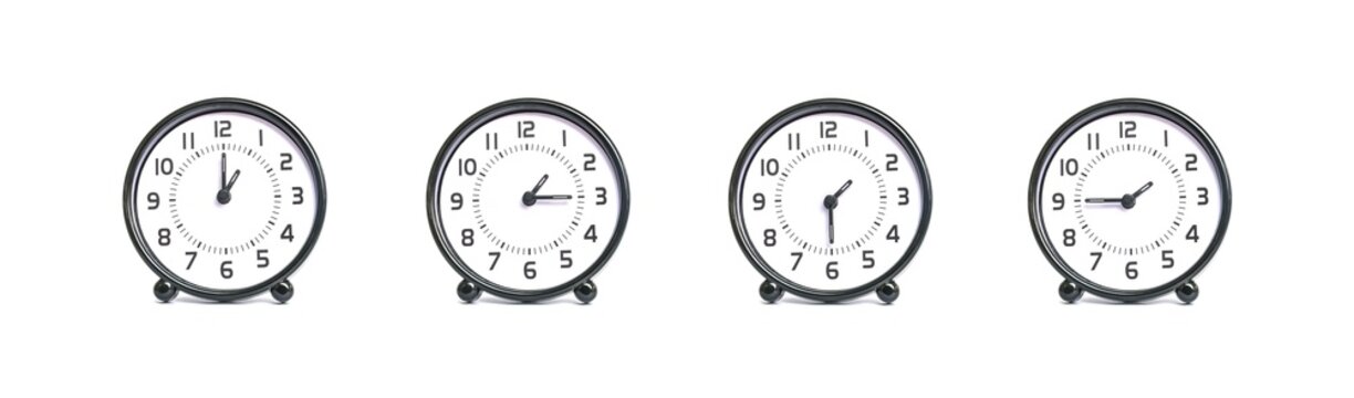 Closeup group of beautiful black and white clock for decoration show the time in 1 , 1:15 , 1:30 , 1:45 p.m. isolated on white background