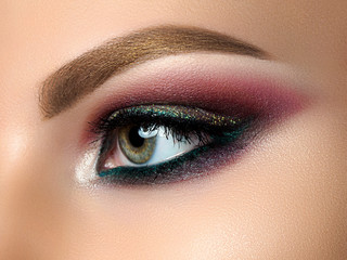 Closeup of beautiful woman eye with fashion makeup
