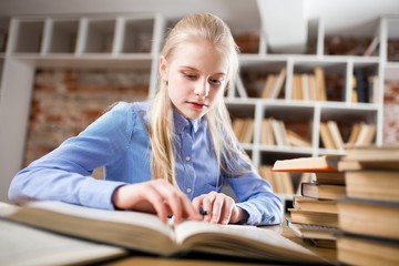 Teenage girl in a library