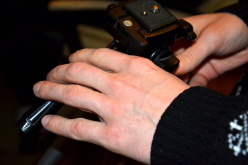 Руки фотогрофа