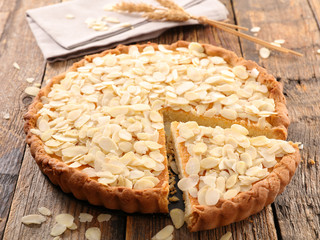 almond cake on wood background