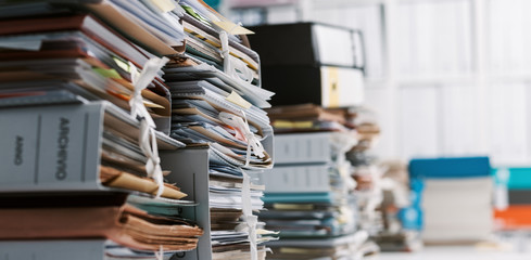 Stacks of paperwork in the office - obrazy, fototapety, plakaty