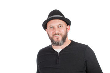 Portrait of bearded man with hat, smiling, isolated on white