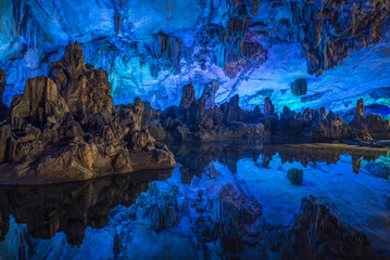 Illumination of underground caves with lakes in Guilin City, Guangxi Province, People's Republic of China
