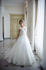 Fototapeta na wymiar Beautiful bride in wedding dress before wedding ceremony