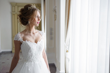 Beautiful bride in wedding dress before wedding ceremony