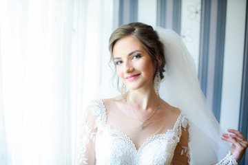 Happy Wedding morning of the bride.  Bride at home getting ready to the wedding ceremony