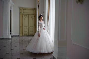 Fototapeta premium beautiful smiling bride before wedding ceremony