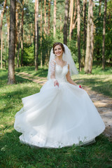 Fototapeta premium wedding dance the bride in park