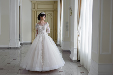 Fototapeta premium beautiful smiling bride before wedding ceremony