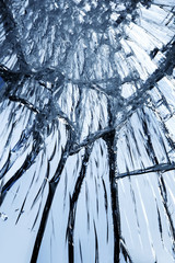 textured mirror background covered with small and large cracks and splinters