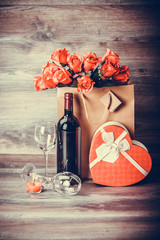 Wine, roses and gift