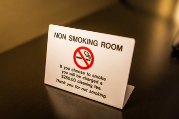 No smoking room sign warning with fee