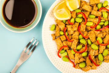 Deep Fried Chinese Style Vegetarian or Vegan Tofu With Spicy Red Chillies And Edamame Beans