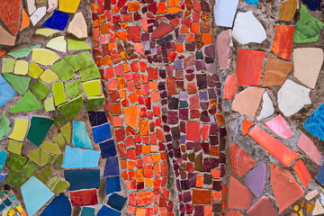 Multicolored mosaic on the walls of buildings in one of the courtyards of St. Petersburg.