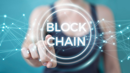 Businesswoman using blockchain cryptocurrency interface 3D rendering