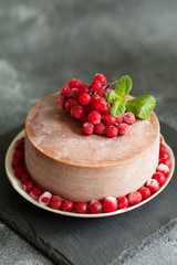 Chocolate mousse cake with lingonberry fruits and mint copy space