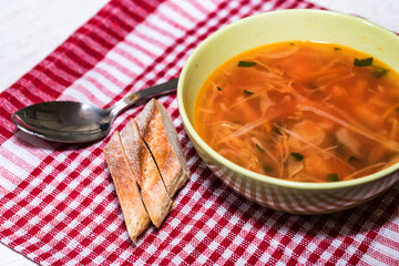Borscht or Russian red vegetable soup in bowl