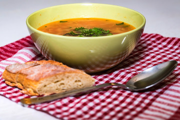 Borscht or Russian red vegetable soup in bowl