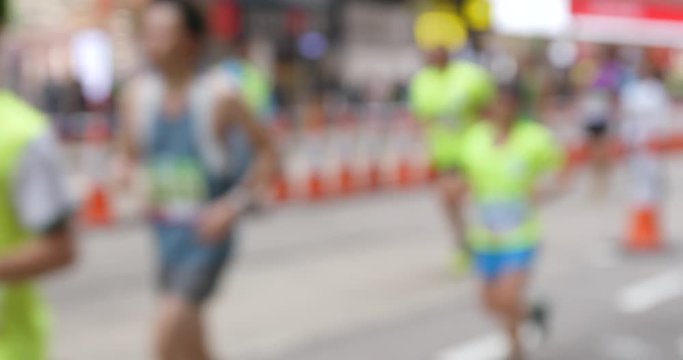 Blur view of marathon in city