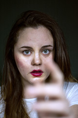 portrait of young woman with freckles